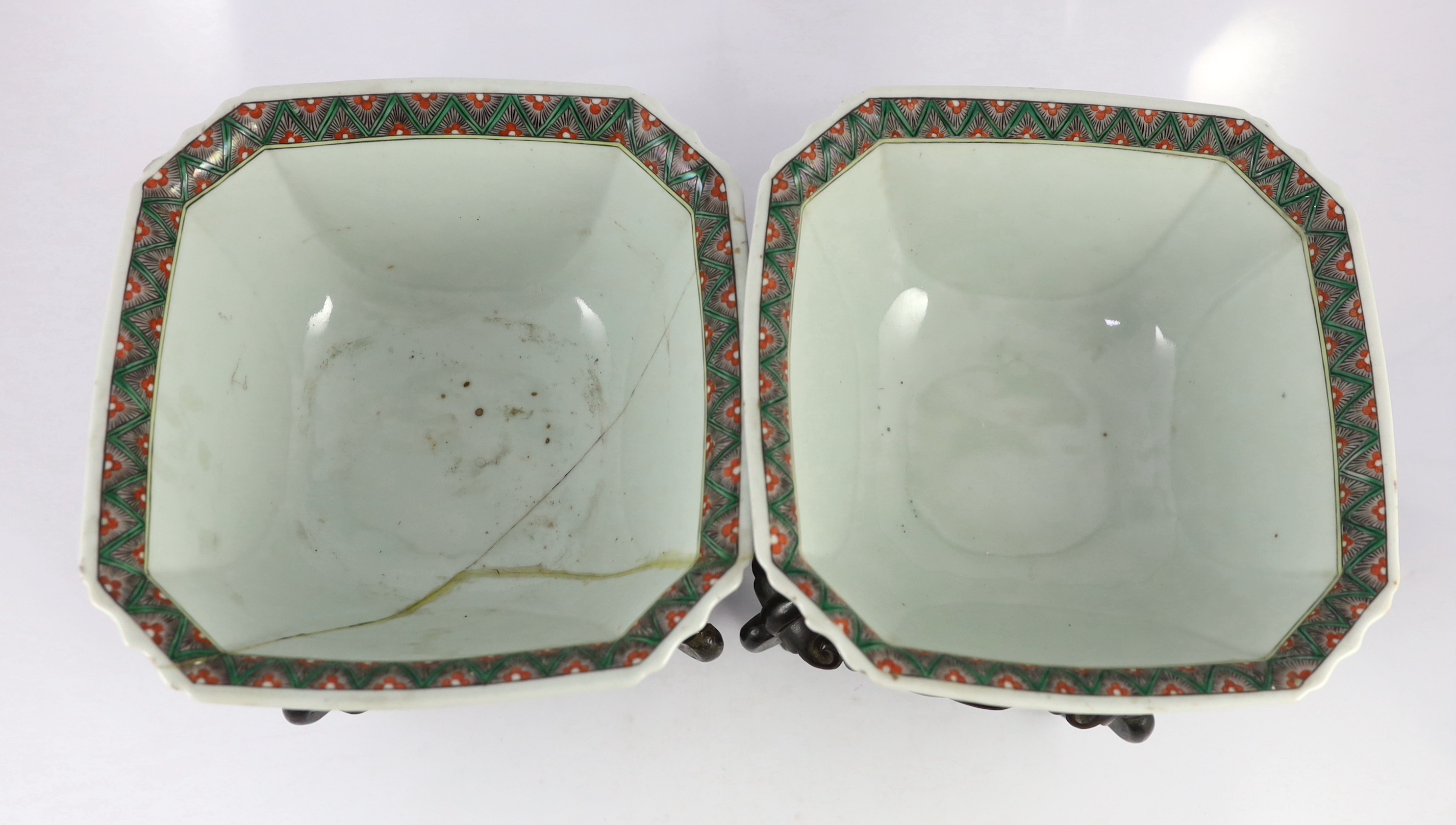 A pair of Chinese famille noire square bowls, late 19th century, one bowl broken and glued, both stands glued